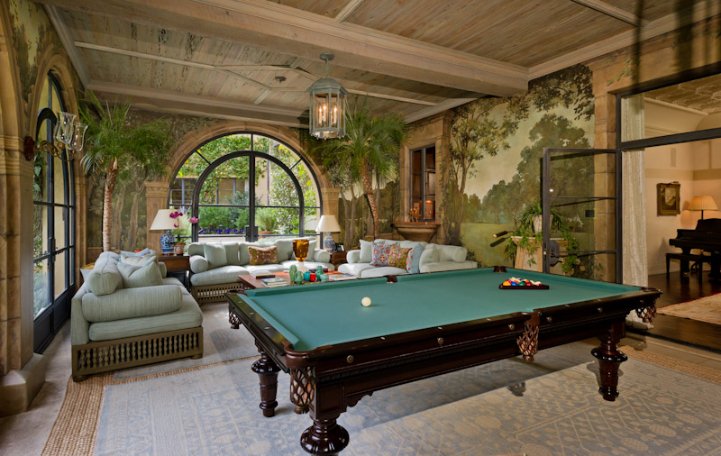 The billiards room Has murals On The wall that exude An outdoor ambiance The billiards room Has murals On The wall that exude An outdoor ambiance